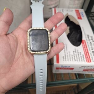 Apple Smartwatch with Gold Bezel and Gray Band